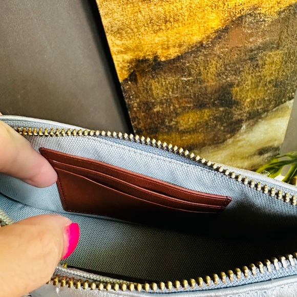 Coach wristlet in silver puffy leather with gold hardware. - Picture 2 of 7